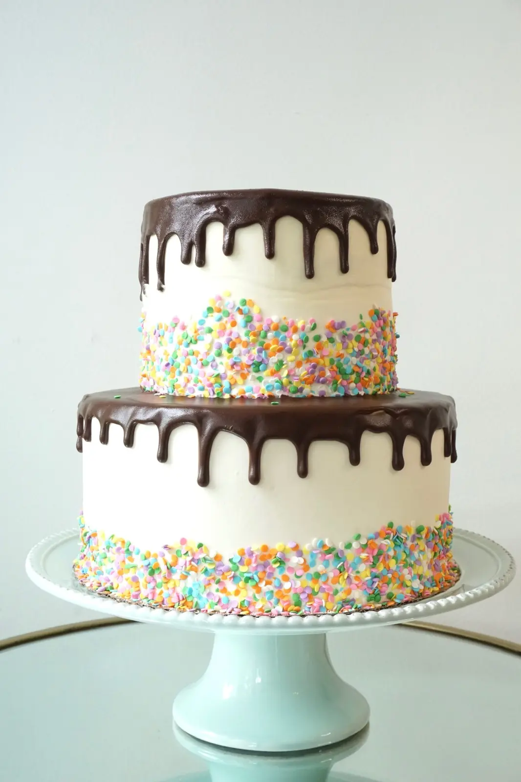 Two-tier Special Celebration cake with chocolate drip and confetti sprinkles