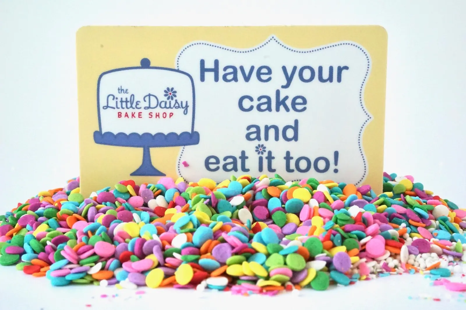 Have your cake and eat it too sign with confetti
