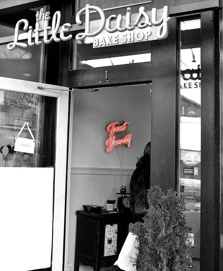 Little Daisy Bake Shop storefront and neon sign